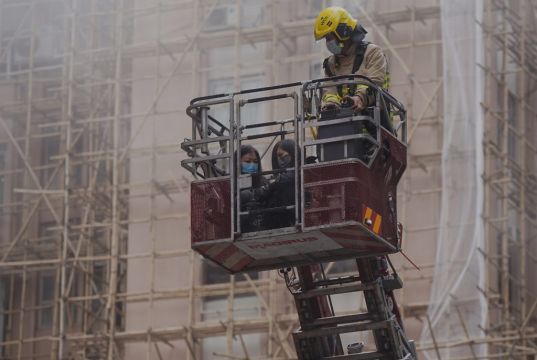 Dozens Trapped At Top Of Hong Kong Skyscraper As Firefighters Tackle Blaze