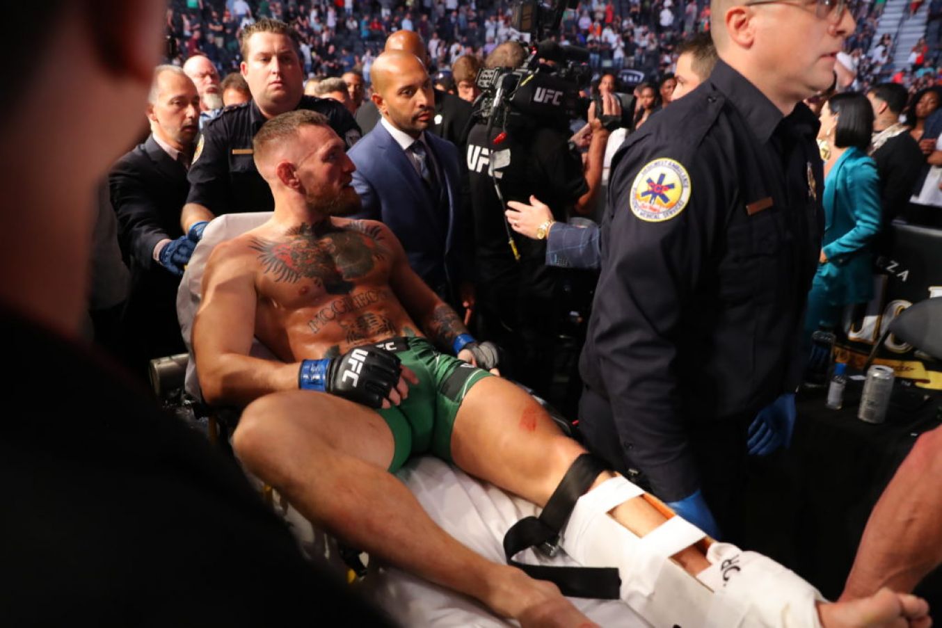 Conor Mcgregor Leaves The Cage On A Stretcher After Injuring His Ankle Fighting Dustin Poirier. ©Inpho/Tom Hogan