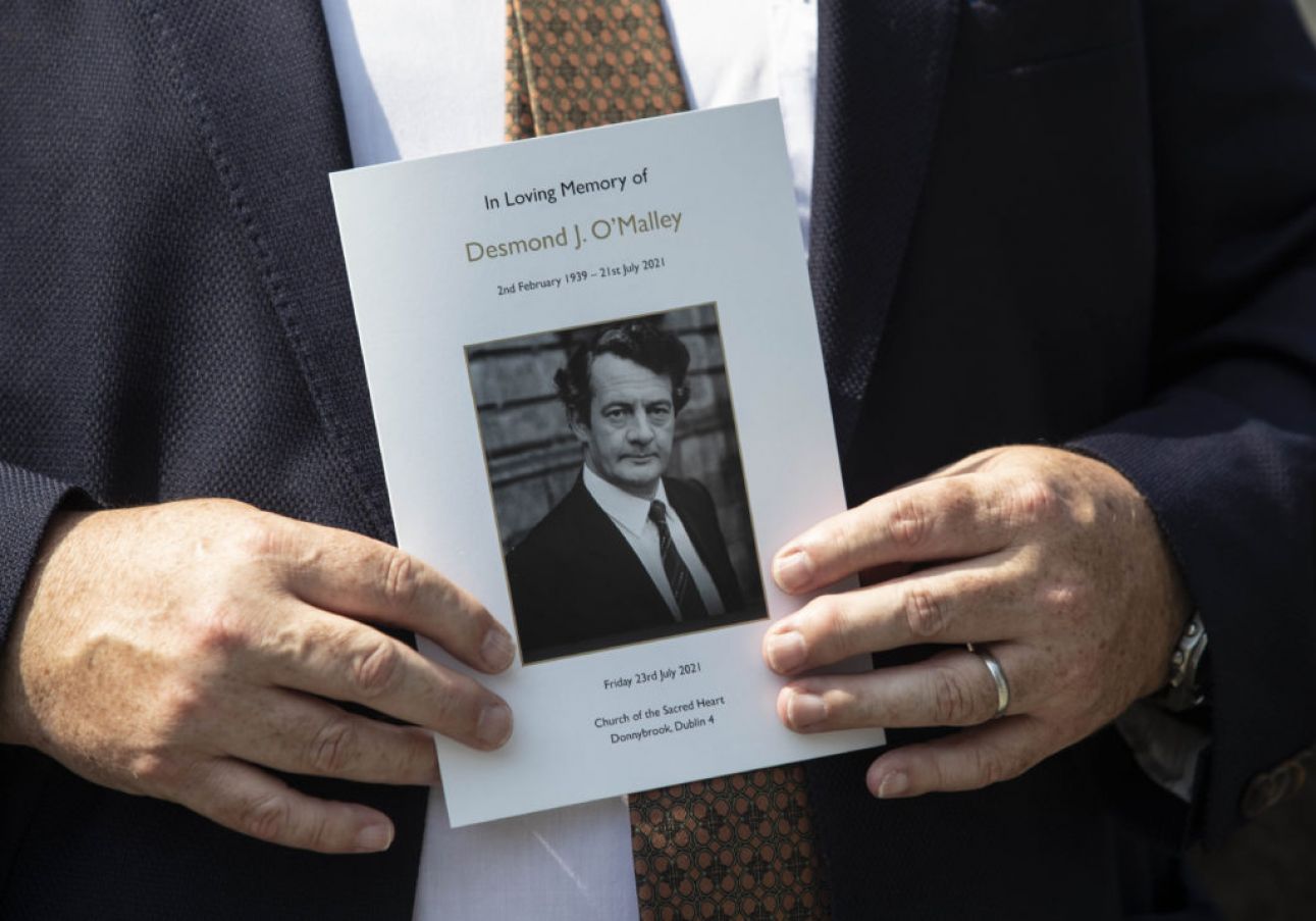 A Mourner Holds A Mass Booklet Outside The Funeral Of Former Politician Des O'malley. Photo: Pa
