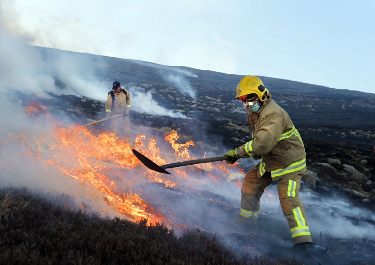 Firefighters Tackle A Blaze On Slieve Donard In  Newcastle, Co Down. Photo: Charles Mcquillan/Getty