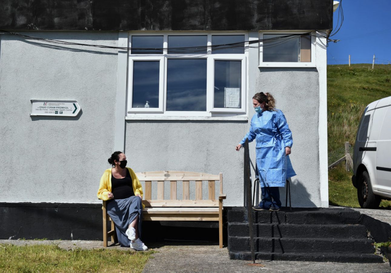Nurse Margaret Lavelle Calls The Next Patient To Receive A Covid Vaccine From The Waiting Area Outside Inishbofin Health Centre. Photo: Charles Mcquillan/Getty