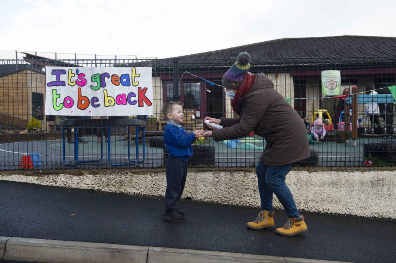 The Head Teacher Of Hazelwood Integrated Nursery School In Newtownabbey, Co Antrim, Sanitises A Child's Hands. Primary Schools Across The Island Returned In March After The Covid Lockdown. Photo: Charles Mcquillan/Getty
