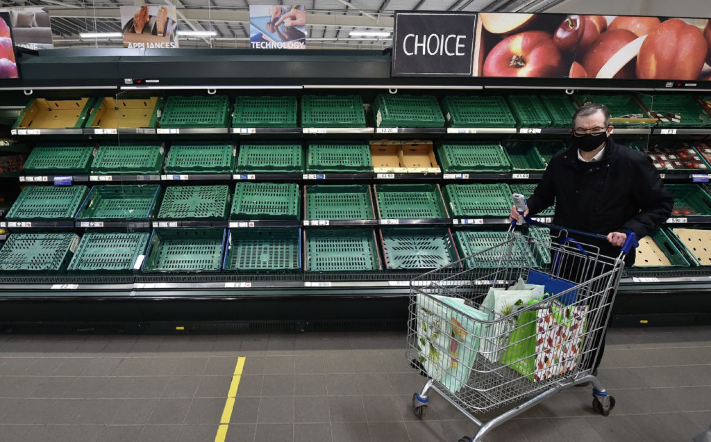 A Shopper Walks Past Rows Of Empty Shelves In Belfast. Some Supermarkets Started The Year With Disruption To Food Supplies After The End Of The Brexit Transition Period. Photo: Charles Mcquillan/Getty