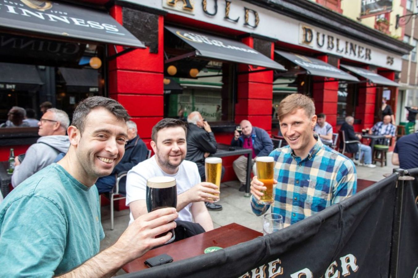 People Sit With Their Drinks At A Table Outside A Reopened Pub In Dublin. Outdoor Service For Hospitality Reopened In June. Photo: Paul Faith/Afp Via Getty