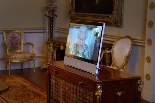 Britain's Queen Elizabeth Pictured At Work Holding Virtual Audiences After Covid Scare