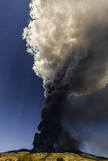 Towering Volcanic Ash Cloud Rises Into Sky As Mount Etna Roars Again