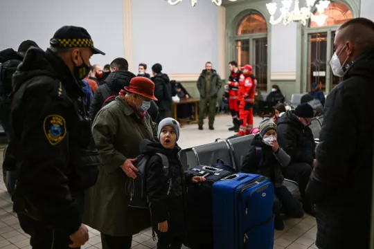 'I Don't Know What To Do': Fleeing Ukrainians Start Arriving In Central Europe