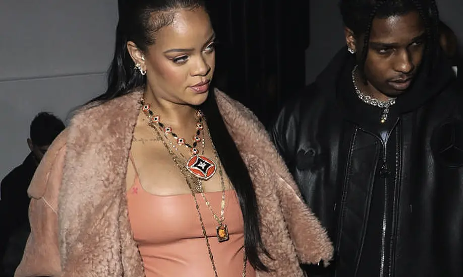 Rihanna Shows Off Baby Bump In Skintight Leather At Off-White Fashion Show