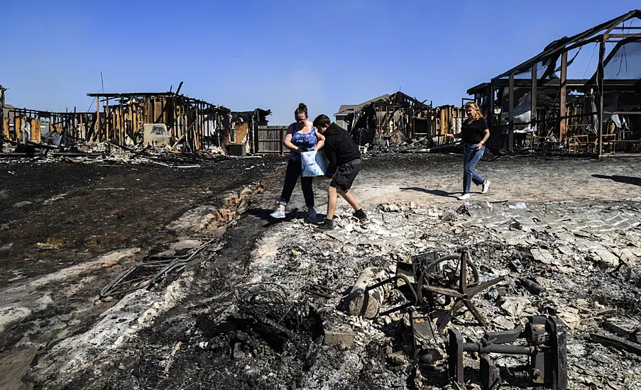 Firefighters Battle Two Massive Wildfires In Florida Panhandle