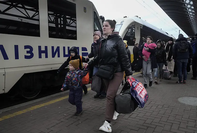 Ukrainians Flee Embattled Cities As Refugee Numbers Pass Two Million