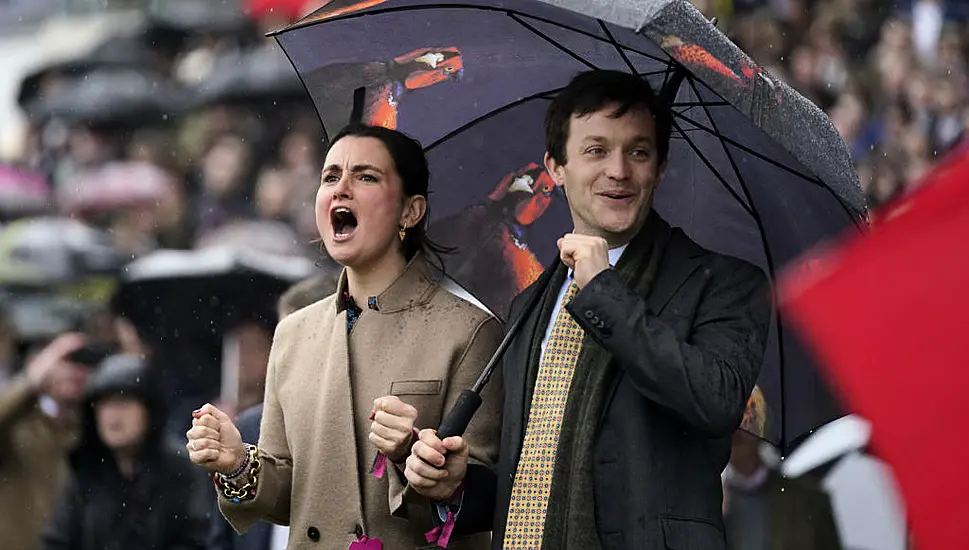 In Pictures: Weather Makes The Biggest Splash At Cheltenham Ladies Day