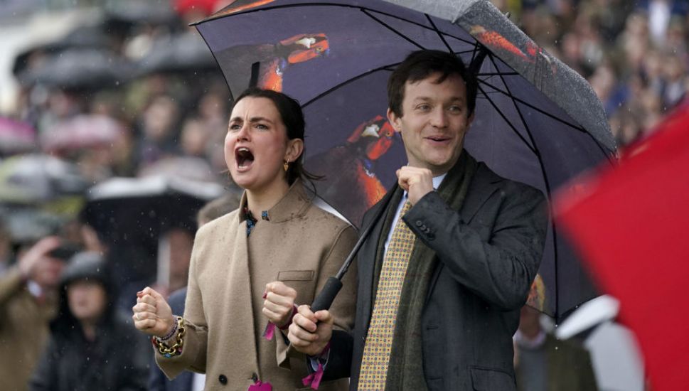 In Pictures: Weather Makes The Biggest Splash At Cheltenham Ladies Day