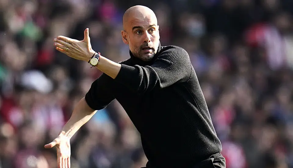 Pep Guardiola Plays Down Manchester City’s Treble Chances