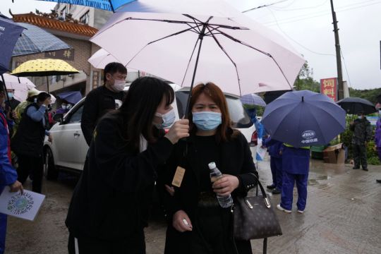 Search At China Plane Crash Site Suspended Amid Rain