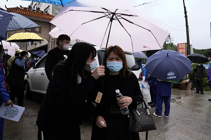 Search At China Plane Crash Site Suspended Amid Rain