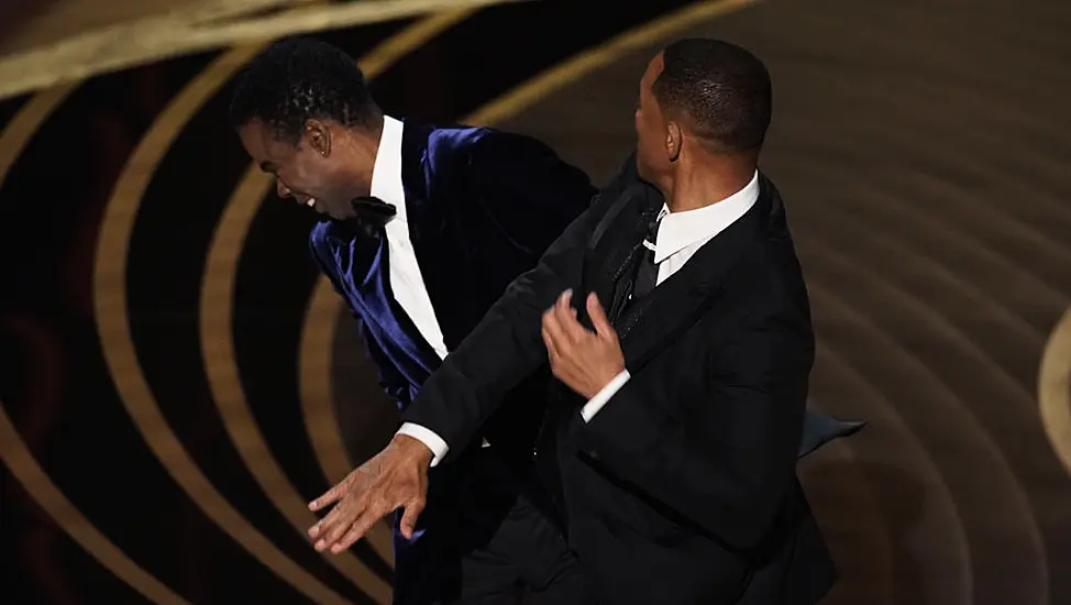 Will Smith Appears To Hit Chris Rock On Oscars Stage After Gag About Wife Jada