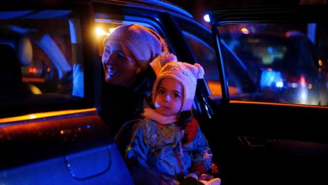 Mothers And Young Children Queue To Return To Ukraine At Polish Train Station