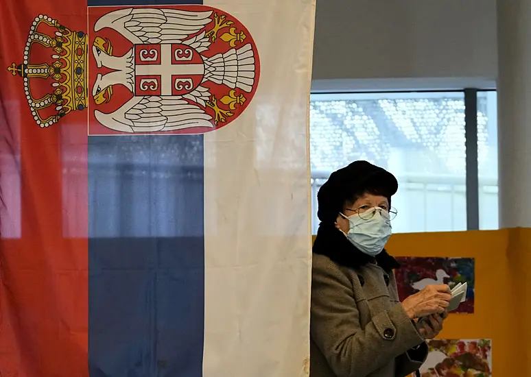 Serbs Vote In Triple Election Set To Keep Populists In Power