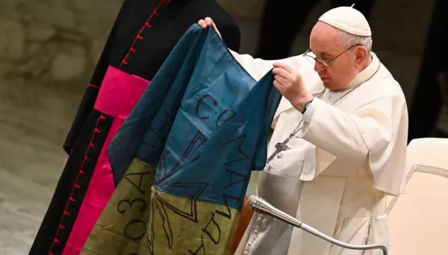 Pope Kisses Ukrainian Flag And Condemns ‘The Massacre Of Bucha’