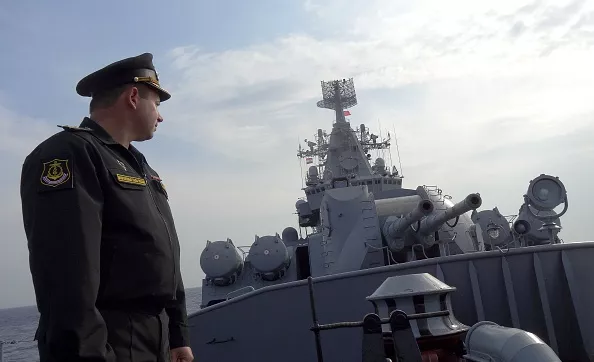 A Russian navy captain stands on the Moskva warship