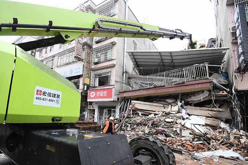 Woman Rescued 50 Hours After China Building Collapse