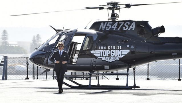 Tom Cruise Lands Helicopter On Aircraft Carrier For Top Gun Sequel Red Carpet