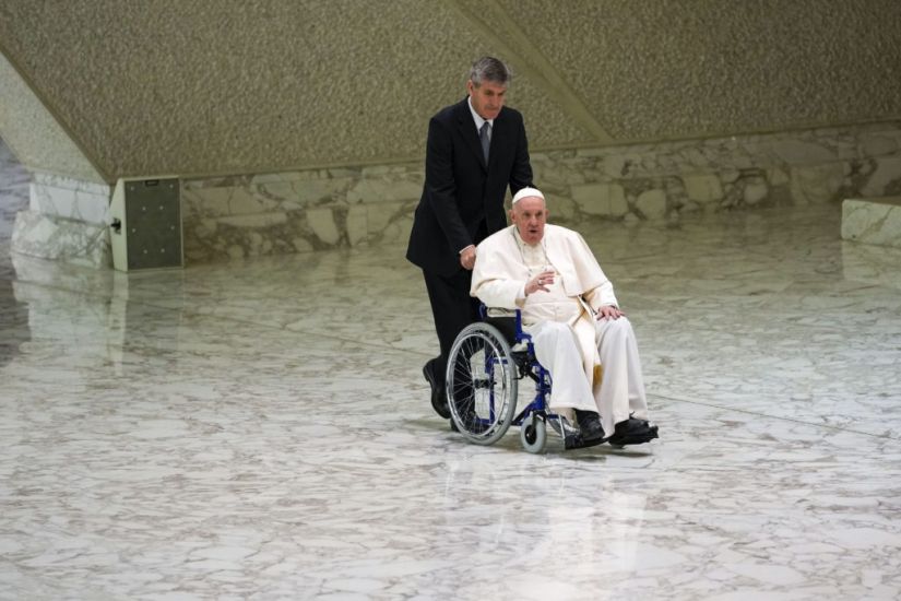 Pope Francis Pictured In A Wheelchair As Knee Pain Continues To Limit Mobility