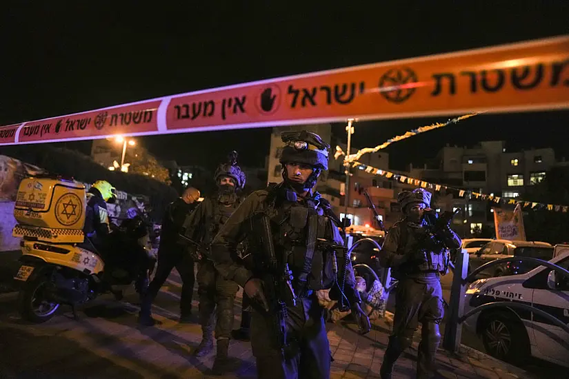 Israeli Police Hunt Two Palestinian Attackers After Fatal Stabbings