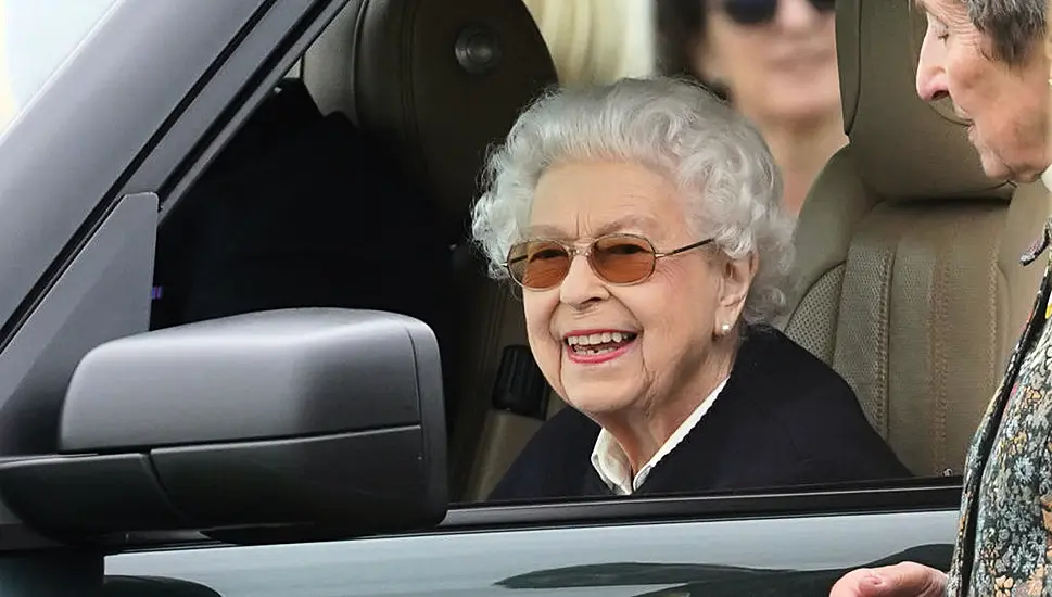 Smiling Queen Elizabeth Arrives At Royal Windsor Horse Show