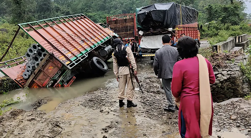 Deaths In Floods And Mudslides Triggered By Heavy Rain In India’s Assam Region