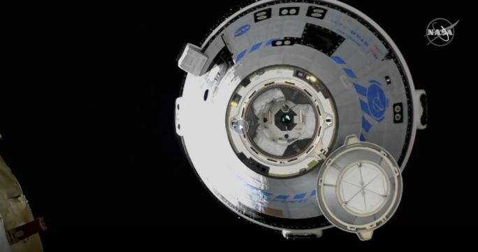 Boeing Docks Crew Capsule To Space Station For First Time