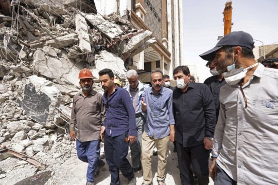 Iranian Police Disperse Crowd Gathered At Collapsed Building