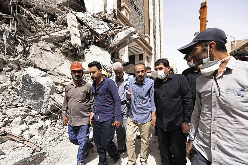 Iranian Police Disperse Crowd Gathered At Collapsed Building