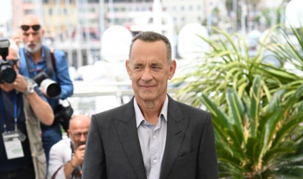 Tom Hanks Reveals Queen Elizabeth's Drink Of Choice Is A Martini