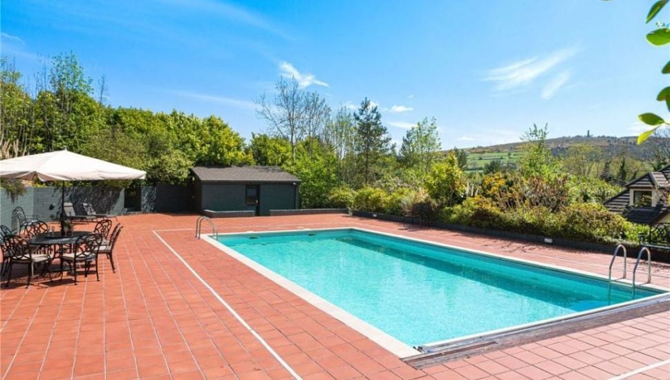 Ireland Or Spain? This Home’s Outdoor Pool And Tennis Court Might Surprise You