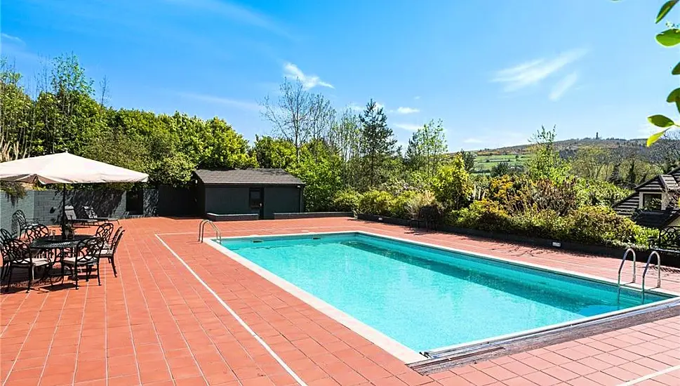 Ireland Or Spain? This Home’s Outdoor Pool And Tennis Court Might Surprise You