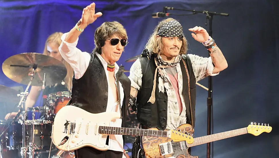 Johnny Depp Returns To Jazz Festival As Guitarist Jeff Beck’s Surprise Guest