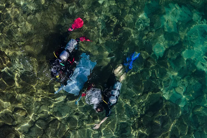 Israeli Divers Haul Rubbish From Ancient Site For Oceans Day