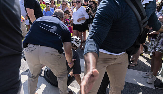 Joe Biden Falls While Getting Off His Bike After Beach Ride