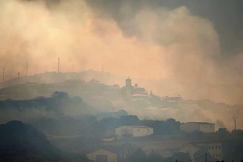 Cooler Weather Helps Spain Tackle Wildfires While Rain Helps In Germany