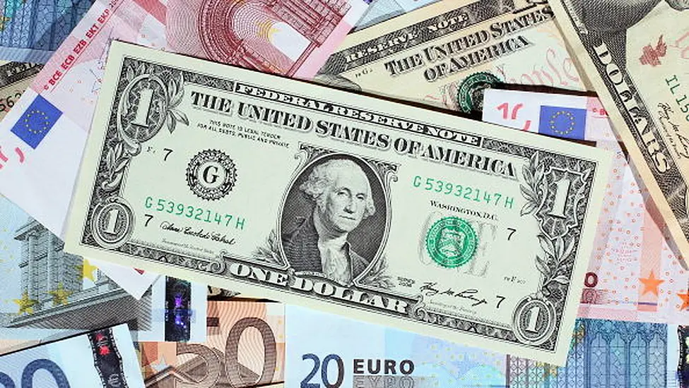 Euro Falls Below Parity With Dollar For First Time In Two Decades