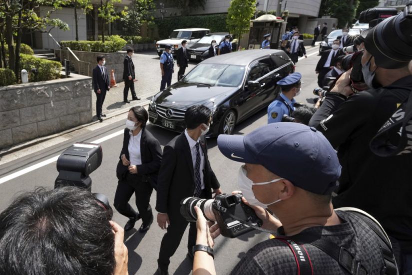 Hearse Carrying Body Of Shinzo Abe Returns Him Home