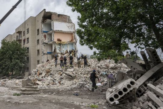 More Than A Dozen Killed As Rockets Destroy Housing Complex In Ukraine