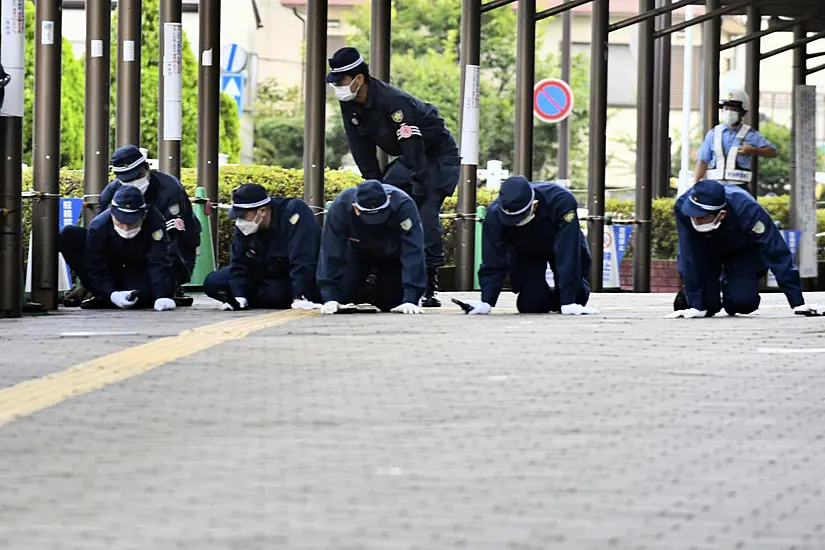 Japanese Police Find Bullet Marks Near Site Of Shinzo Abe’s Shooting