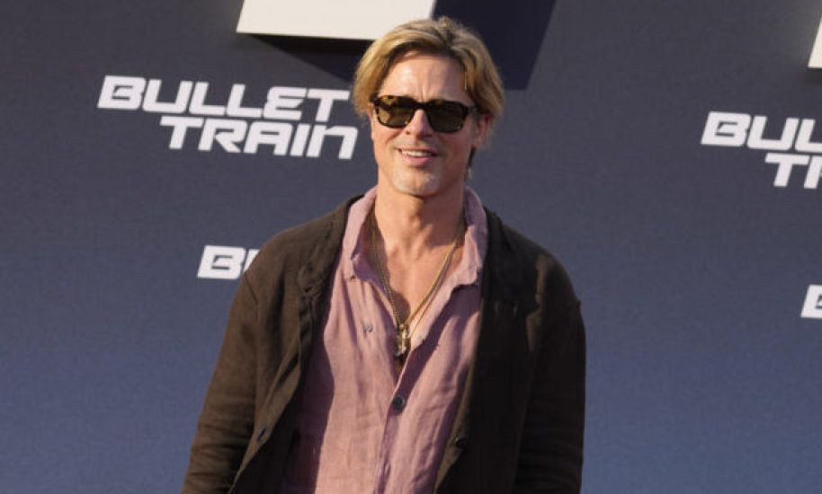 Brad Pitt Swaps Trousers For A Skirt At Berlin Red Carpet Event
