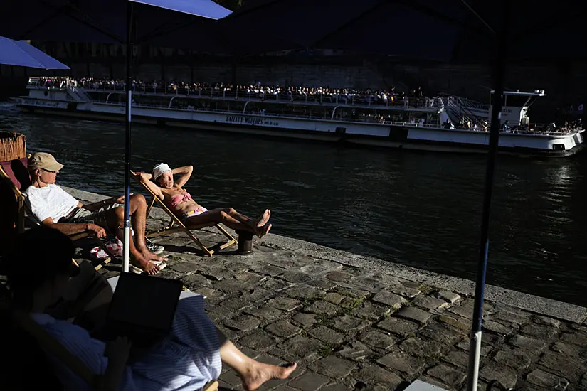 France’s Second Heatwave Of The Year Leaves Paris Sweltering