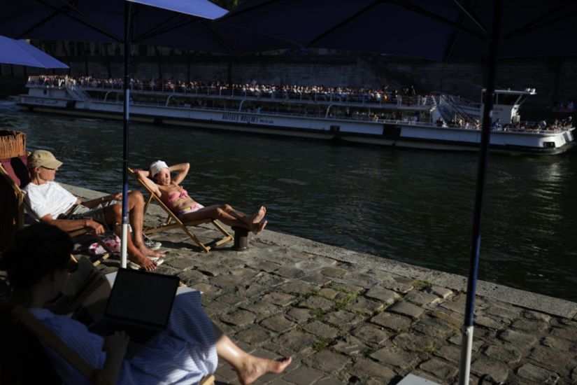 France’s Second Heatwave Of The Year Leaves Paris Sweltering