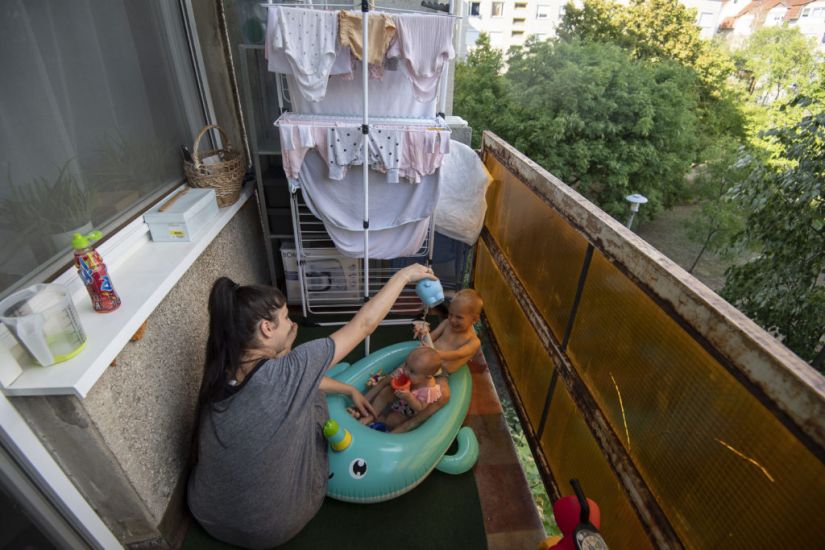 In Pictures: How People In Budapest Are Keeping Cool Amidst Heatwave