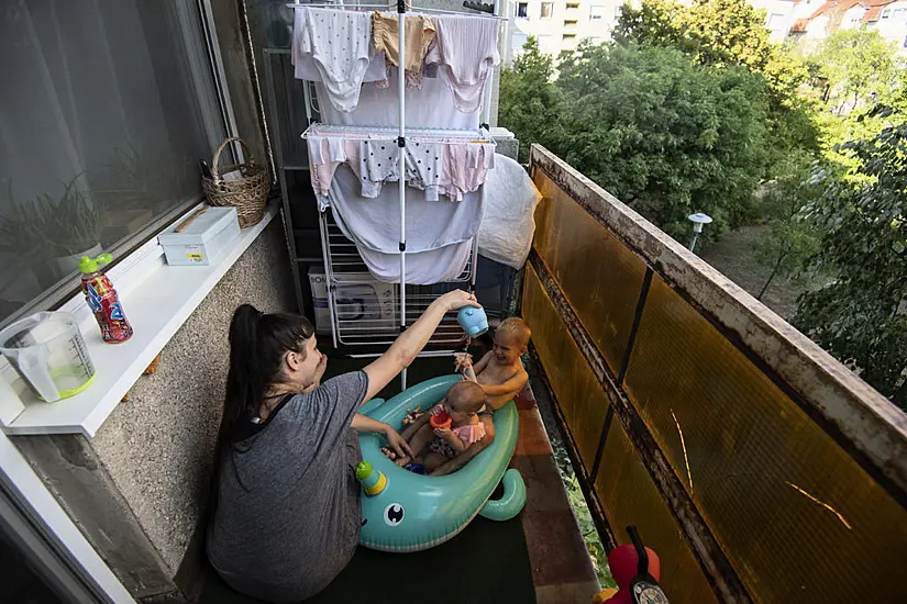 In Pictures: How People In Budapest Are Keeping Cool Amidst Heatwave