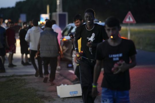 Buses Move 400 Asylum Seekers From Squalid Dutch Camp